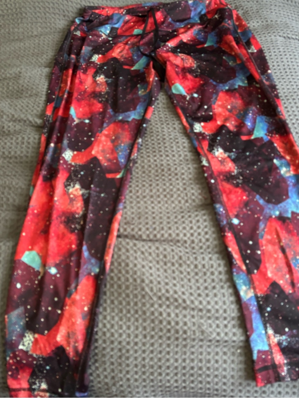 Danskin Woman’s Red Black Galaxy Print Leggings SzL never worn Excellent